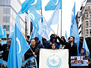 Activists protest the treatment of Uyghur Muslims by Chinese authorities in Xinjiang province. (Shutterstock/ File Photo)