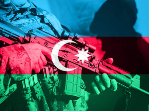 Soldier with machine gun with national flag of Azerbaijan  (Shutterstock)	