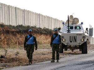 United Nations Interim Force in Lebanon (UNIFIL) soldiers patrol along the border wall with Israel near the southern Lebanese village of Kfar Kila on December 4, 2018. (Mahmoud Zayyat/AFP)