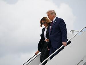 US President Donald Trump and First Lady Melania Trump step off Air Force One upon arrival at Cleveland Hopkins International Airport in Cleveland, Ohio on September 29, 2020. President Trump is in Cleveland, Ohio for the first of three presidential debates. MANDEL NGAN / AFP