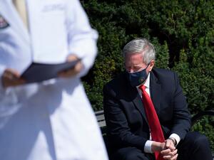 Sean Conley, Physician to US President Donald Trump, and White House Chief of Staff Mark Meadows(R) listen while an update on the President's health as he is treated for a COVID-19 infection at Walter Reed Medical Center October 4, 2020, in Bethesda, Maryland. US President Donald Trump has "continued to improve" as he is treated for Covid-19, his doctors said October 4, 2020, revealing he could be discharged as early as October 5, 2020. His medical team said his oxygen levels had dropped twice briefly in re