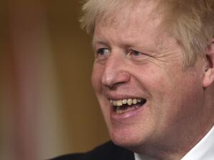 Britain's Prime Minister Boris Johnson speaks during a virtual press conference inside 10 Downing Street in central London on October 16, 2020 ahead of the imposition of tighter restrictions in some parts of England including London aimed at combating the spread of the novel coronavirus. Roughly half of England is now under tougher coronavirus restrictions, after the government on October 15 announced more stringent measures for London and seven other areas to try to cut surging numbers of cases. Eddie MULH