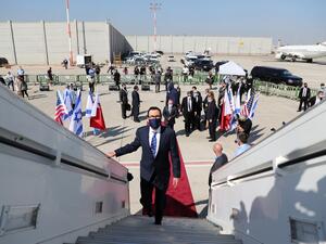 US Treasury Secretary Steve Mnuchin boards the El Al flight to Bahrain's capital Manama at Israel's Ben Gurion Airport near Tel Aviv on October 18, 2020, after the two states reached a US-brokered normalisation deal last month. RONEN ZVULUN / POOL / AFP