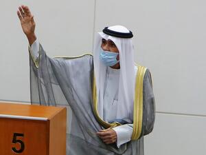 Emir of Kuwait Sheikh Nawaf al-Ahmad al-Jaber al-Sabah gestures in greeting upon arrival to attend the opening of the 5th regular session at the country's National Assembly (parliament) in Kuwait City on October 20, 2020. YASSER AL-ZAYYAT / AFP