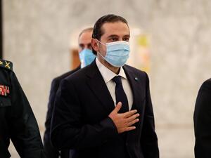 Former Lebanese prime minister Saad Hariri (C) arrives at the office of President Michel Aoun, after the latter appointed him to form a new cabinet, at the presidential palace in Baabda, east of the capital Beirut, on October 22, 2020. Aoun today named former premier Saad Hariri to form a new cabinet to lift the country out of crisis after most parliamentary blocs backed his nomination. Hariri, who has previously led three governments in Lebanon, stepped down almost a year ago under pressure from unpreceden