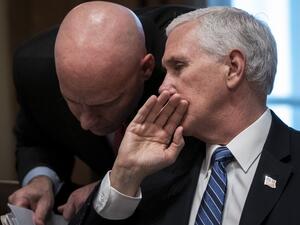 In this file photo taken on March 2, 2020 US Vice President Mike Pence and his chief of staff Mark Short confer during a meeting with the White House Coronavirus Task Force and pharmaceutical executives in Cabinet Room of the White House in Washington, DC. US Vice President Mike Pence's chief of staff tested positive for Covid-19 on October 24, a spokesman said, the latest in a list of figures connected to Donald Trump's administration to do so. Drew Angerer / GETTY IMAGES NORTH AMERICA / AFP