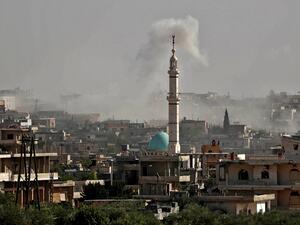 This picture taken on October 27, 2020 shows smoke rising from Syrian government forces' bombardment on the village of al-Bara, in the southern part of the rebel-held northwestern province of Idlib. OMAR HAJ KADOUR / AFP