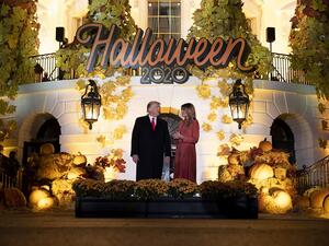 President Donald Trump and First Lady Melania Trump great guests on the south lawn of the White House on October 25, 2020 in Washington, DC. To ensure the health and safety of guests and staff during the Halloween festivities, extra measures such as facemasks, social distancing, and hand-sanitizer were put in place. Tasos Katopodis/Getty Images/AFP TASOS KATOPODIS / GETTY IMAGES NORTH AMERICA / Getty Images via AFP