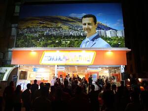 Shoppers crowded outside an Emmatel store in an upmarket district of Damascus. (Courtesy Emmatel)