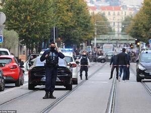 French policemen stand guard a street after a knife attack in Nice. (AFP)