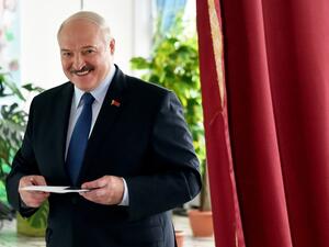 Belarus' President Alexander Lukashenko votes at a polling station during the presidential election in Minsk on Sunday. Photo: AFP