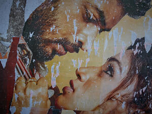 Bollywood movie poster stuck in the street (Shutterstock)