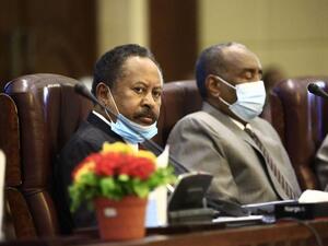 Sudan’s Prime Minister Abdalla Hamdok (left) and Sovereign Council chief General Abdel Fattah al-Burhan attend a conferecne in the capital Khartoum on September 26. (AFP)