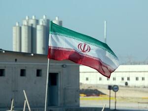 An Iranian flag flutters at Iran's Bushehr nuclear power plant on November 10, 2019. (Atta Kenare/AFP)