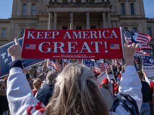Supporters of US President Donald Trump rally at the State Capitol in Lansing, Michigan, on November 7, 2020, after Democratic Presidential nominee Joe Biden was declared the winner of the 2020 US elections. SETH HERALD / AFP