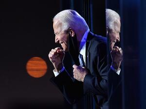 US President-elect Joe Biden gestures to the crowd after he delivered remarks in Wilmington, Delaware, on November 7, 2020. Democrat Joe Biden was declared winner of the US presidency November 7, defeating Donald Trump and ending an era that convulsed American politics, shocked the world and left the United States more divided than at any time in decades. Angela Weiss / AFP