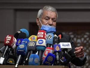 The chairman of the Libyan political accord committee, member of the High Council of State Bachir El Haouch speaks to journalists during a press conference on the UN-led Libyan talks, in the tunisian capital Tunis, on November 14, 2020. FETHI BELAID / AFP