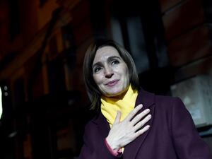 Moldova's presidential candidate Maia Sandu gestures as she leaves the Action and Solidarity Party office in Chisinau, early on November 16, 2020, following her victory in the second round of the country's presidential election. Sergei GAPON / AFP