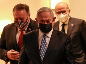 (L to R) US Secretary of State Mike Pompeo, Israeli Prime Minister Benjamin Netanyahu, and Bahrain's Foreign Minister Abdullatif bin Rashid Al Zayani, all mask-clad due to the COVID-19 coronavirus pandemic, arrive for a press conference after their trilateral meeting in Jerusalem on November 18, 2020. Menahem KAHANA / POOL / AFP