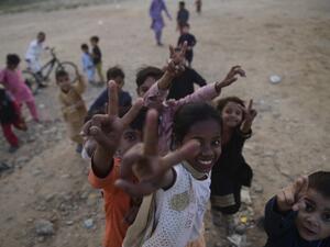 Children play in a ground during the World Children's Day in Karachi on November 20, 2020. Asif HASSAN / AFP