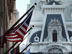 An American Flag hangs from a building in Philadelphia the morning after Americans voted in the presidential election on November 04, 2020 in Philadelphia, Pennsylvania. With no winner declared in the presidential election last night, all eyes are on the outcome in a few remaining swing states to determine whether Donald Trump will get another four years or if Joe Biden will become the next president of the United States. The counting of ballots in Pennsylvania continued through the night with no winner yet