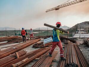Workers at the Grand Ethiopian Renaissance Dam in Ethiopia on 26 December 2019 [EDUARDO SOTERAS/AFP/Getty Images]