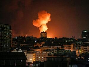 An explosion following an Israeli airstrike on Islamic Jihad sites in Gaza City. /AFP