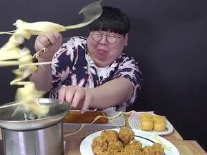 Unfortunately the building pressure of the solidifying cheese sees part of the machine fly off as strings of cheese fling around the room (YouTube)