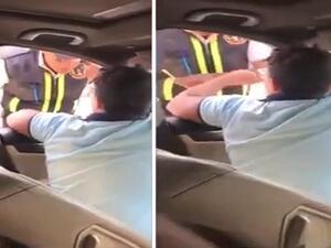 مراهق يقود سيارة فارهة ويعتدي على رجل مرور في مصر