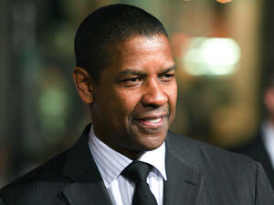 Denzel Washington attends The Book of Eli premiere on January 11 2010 at Grauman's Chinese Theater in Hollywood, California. (shutterstock)