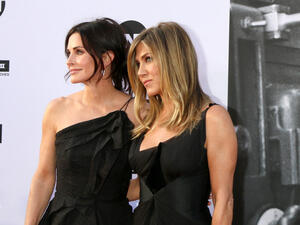 Courteney Cox, Jennifer Aniston at the American Film Institute Lifetime Achievement Award to George Clooney at the Dolby Theater. (shutterstock)