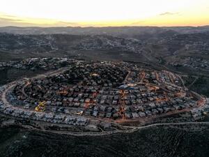 This picture taken on November 17, 2020 shows an aerial view of the Israeli settlement of Tekoa in the occupied West Bank, south of Bethlehem. MENAHEM KAHANA / AFP