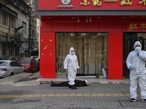 The World Health Organization declared a global emergency over the new coronavirus, as China reported on January 31 the death toll had climbed to 213 with nearly 10,000 infections. Hector RETAMAL / AFP