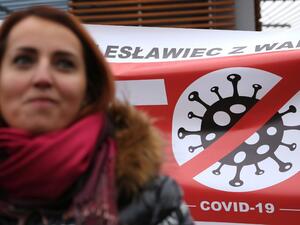A protester takes part in a demonstration against measures to curb the spread of the novel coronavirus (COVID-19), in Slubice, Poland, on November 28, 2020. Adam Berry / AFP