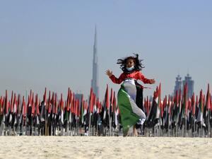 Emiratis attend celebrations of UAE's national day on December 2, 2020. Karim SAHIB / AFP
