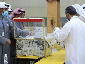 Kuwaitis hoping for reform went to the polls in a parliamentary election overshadowed by COVID-19, with facilities laid on so citizens infected with the disease could vote in special polling stations. YASSER AL-ZAYYAT / AFP