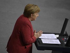 German Chancellor Angela Merkel speaks during a debate at the Bundestag (lower house of parliament) in Berlin on December 9, 2020, on the eve of a EU summit. Tobias SCHWARZ / AFP