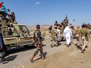 Fighters loyal to Yemen's separatist Southern Transitional Council (STC) travel in a convoy in Yemen's southern Abyan province, on December 13, 2020, as part of a withdrawal according to a power sharing agreement brokered in the Saudi capital Riyadh days earlier. Yemen's internationally recognised government and southern separatists are expected to form a cabinet within the week according to Saudi officials, kicking off the implementation of a Riyadh-sponsored power sharing agreement. The agreement struck l