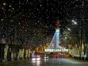 A view of the St. George Monument at Tbilisi's Freedom Square decorated for the upcoming Christmas and New Year holidays during a night-time curfew imposed by the government amid the ongoing coronavirus disease pandemic late on December 17, 2020. Vano Shlamov / AFP
