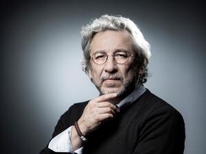 This file photo taken on September 10, 2018 during a photo session in Paris shows Turkish prominent journalist Can Dundar, exiled in Germany, who has been sentenced to more than 27 years in jail by a Turkish court on charges of aiding a terror group and espionage, local media reported on December 23, 2020. The court in Istanbul found Dundar, who served as editor-in-chief of the opposition Cumhuriyet daily before fleeing to Germany in 2016, guilty over a story about an arms shipment intercepted at the Syrian