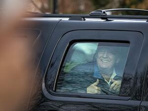 U.S. President Donald Trump gives a thumbs up towards supporters as he departs Trump National Golf Club on December 13, 2020 in Sterling, Virginia. Al Drago/Getty Images/AFP Al Drago / GETTY IMAGES NORTH AMERICA / Getty Images via AFP