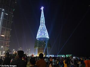The largest artificial Christmas tree resides in Sri Lanka (pictured), which stands more than 236 feet tall and made the Guinness World Records for its height. However, Williams’ tiny artificial tree may be an even greater achievement. (AFP/File)