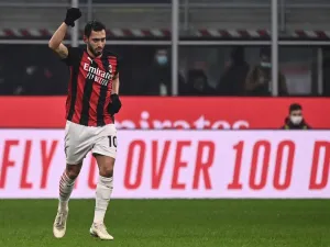 The Italian head coach has given an update on the Turkey international's contract situation at San Siro (Photo: AFP)