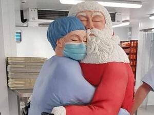 Staff at the Royal Bolton Hospital and from across the organisation had a very special treat on Friday, when extreme cake maker Rosie Dummer delivered them a 6 foot cake for Christmas (Twitter)