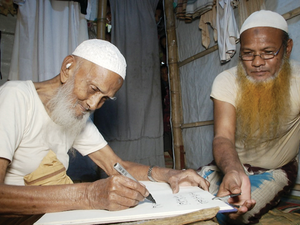 Mohammad Ershad, a 108-year-old Rohingya refugee, is renowned for his calligraphy at the Cox’s Bazar camps in Bangladesh. (Twitter)