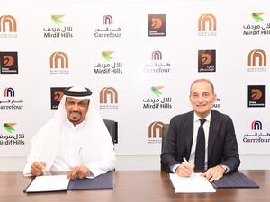 دبي للاستثمار توقع اتفاقية لافتتاح فرع "كارفور" في تلال مردف