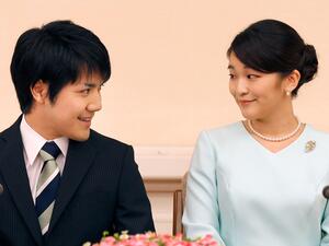 Princess Mako, right, and her fiancee Kei Komuro. Shizuo Kambayashi / AFP