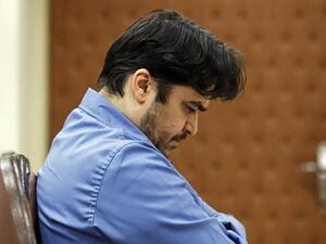 Ruhollah Zam during his trial at Iran's Revolutionary Court in Tehran on June 2, 2020. (AFP)