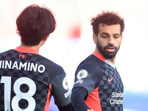 صلاح ومينامينو خلال لقاء ليفربول وكريستال بالاس صلاح ومينامينو خلال لقاء ليفربول وكريستال بالاس