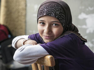  Syrian refugee girl at a camp in Passau, Germany  (Shutterstock)	